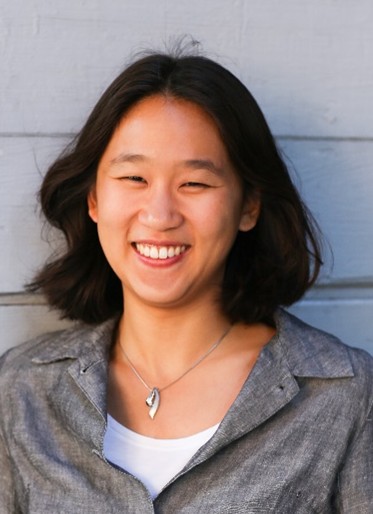 Portrait photograph of Coty Jen smiling.